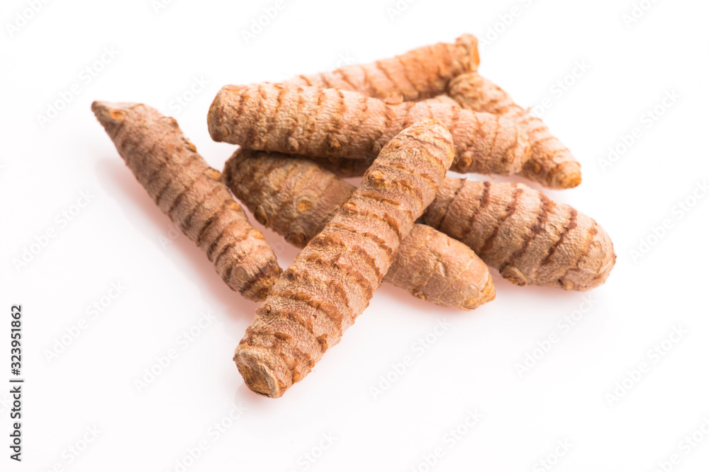 Turmeric whole tubers kurkuma, curcuma. Oriental spice Turmeric whole tubers kurkuma, curcuma. Oriental spice
