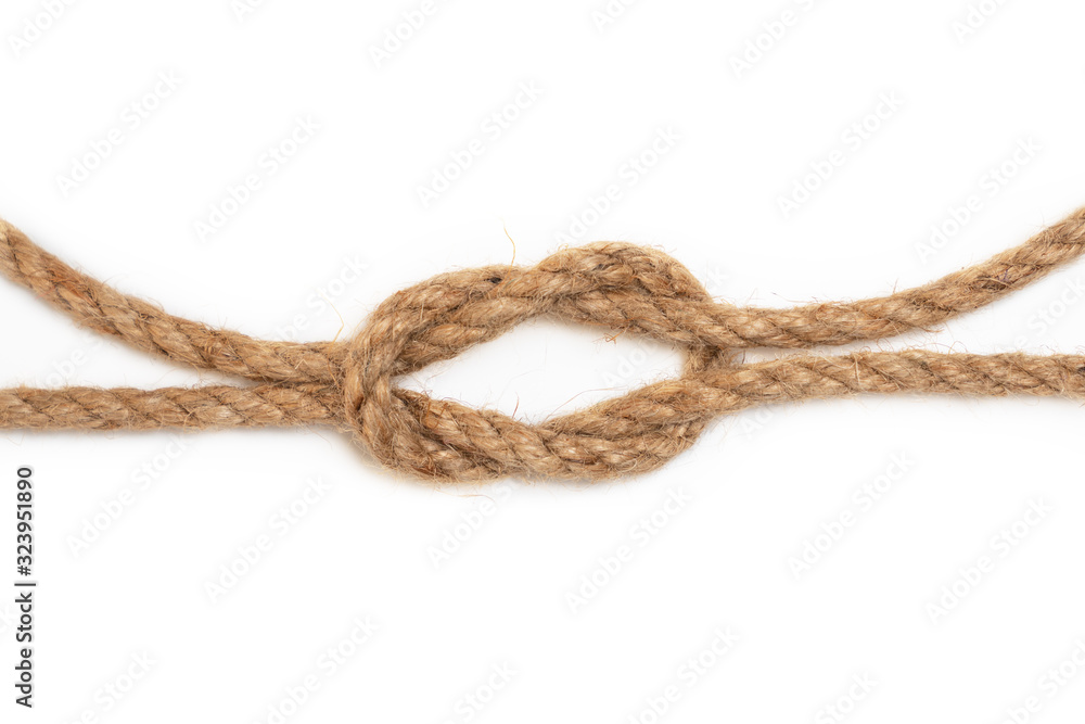 Brown jute rope with knot isolated on white background.
