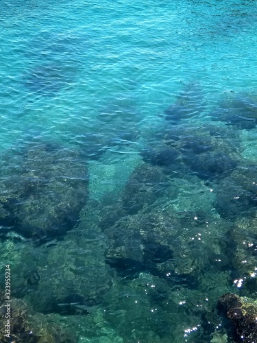 deep clear blue sea with roks