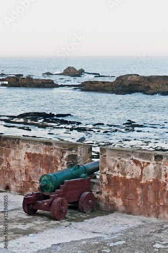 Defensive wall cannons at Essaouira, Morocco photo