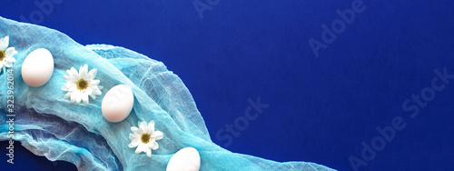 Photography Festive easter banner with white eggs.
