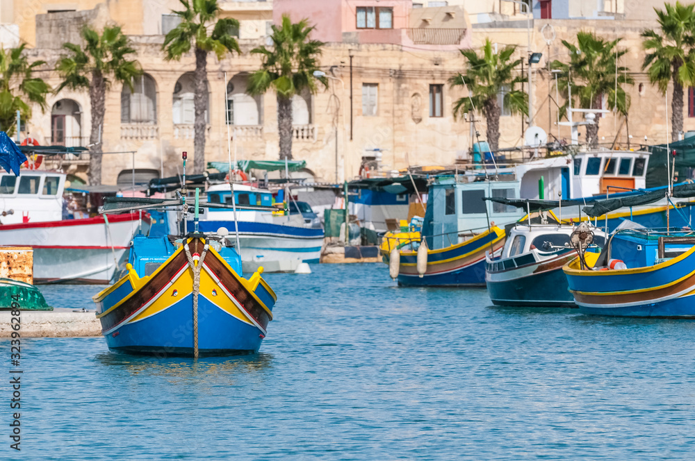 Fototapeta premium Traditional Luzzu boat at Marsaxlokk harbor in Malta.