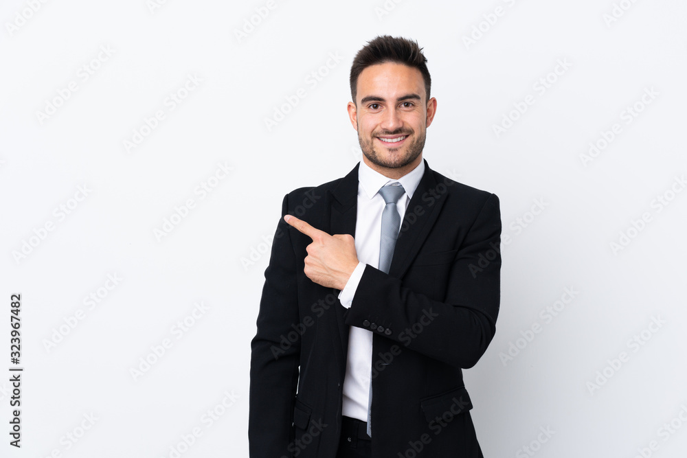 Young business man over isolated background pointing finger to the side Young business man over isolated background pointing finger to the side