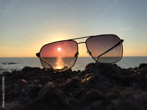Wallpaper Mural sunglasses on the beach at sunset Torontodigital.ca