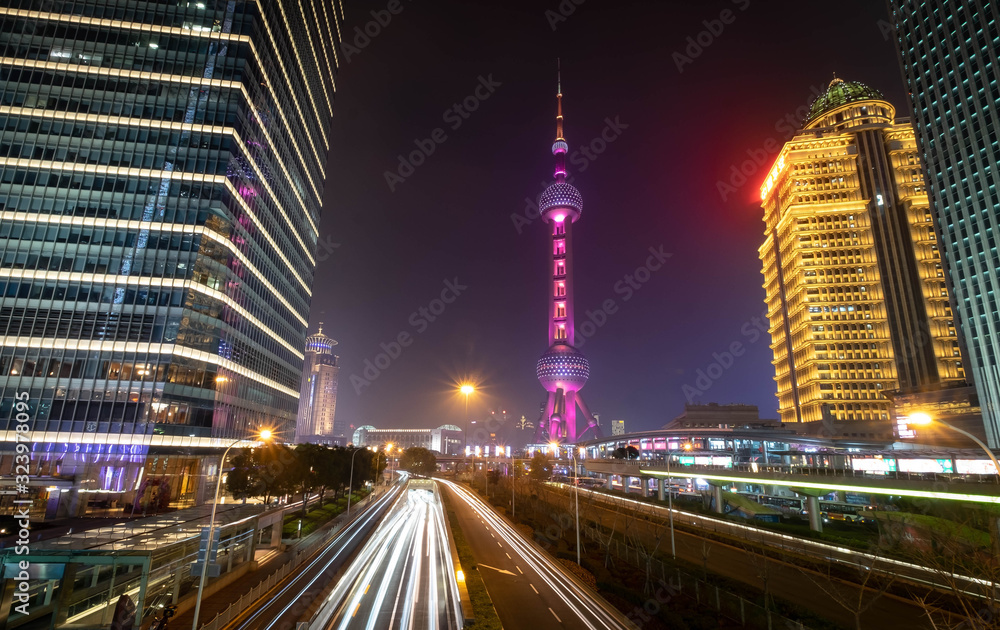 A night view of the modern Pudong skyline across the Bund in Shanghai, China.