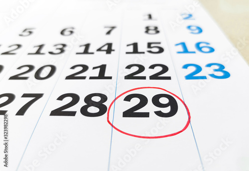 calendar of february in leap year with 29 number in red circle photo