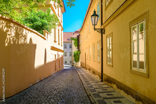 View to the street in the old center of Prague - the capital and largest city of the Czech Republic - travel background