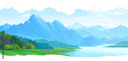 Misty blue mountains along a range and a river flowing around the meadows