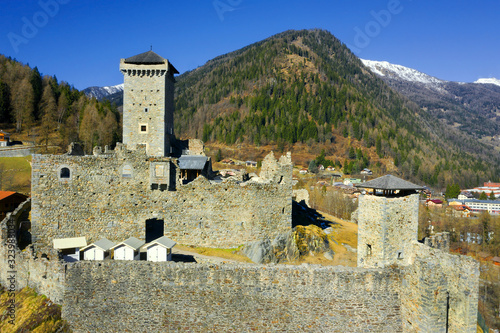 Castle San Michele of Ossana village of Val di Sole, Italy, Alps. Ossana is a comune (municipality) in Trentino in the northern Italian region Trentino-Alto Adige, Südtirol, Italy photo