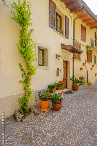 Entrance of an old apartment building in Limone, Garda, Italy.