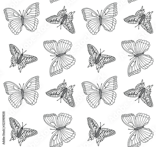 Vector seamless pattern of hand drawn doodle sketch butterfly isolated on white background