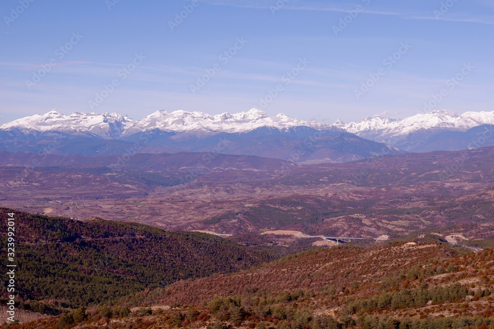 Husk covers a beautiful mountain landscape with snowy picks in the area of the Puerto de Monrepos, Aragon, Spain. View from the road observation platform