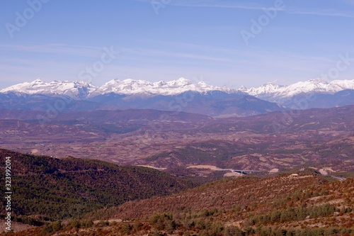 Husk covers a beautiful mountain landscape with snowy picks in the area of the Puerto de Monrepos, Aragon, Spain. View from the road observation platform © Yana Demenko