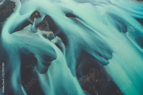 Blue glacier river in Iceland from an aerial perspective