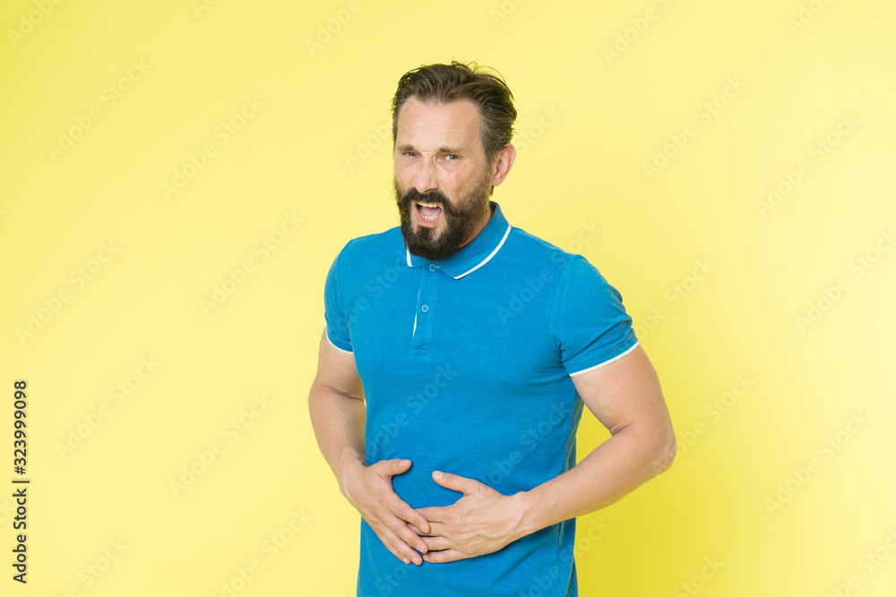 Intestinal ulcer. Man mature painful face got injured. Problems with health appears with ageing. Man touch belly. Guy feels pain in stomach. Healthcare and treatment concept. Indigestion problem Intestinal ulcer. Man mature painful face got injured. Problems with health appears with ageing. Man touch belly. Guy feels pain in stomach. Healthcare and treatment concept. Indigestion problem