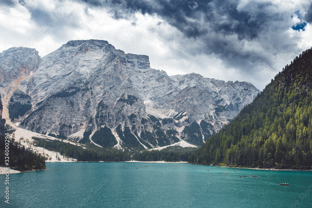 Obraz premium Panoramic view of Lake Braies in the mountains. View from above. Aerial view of Braies lake. Dolomites