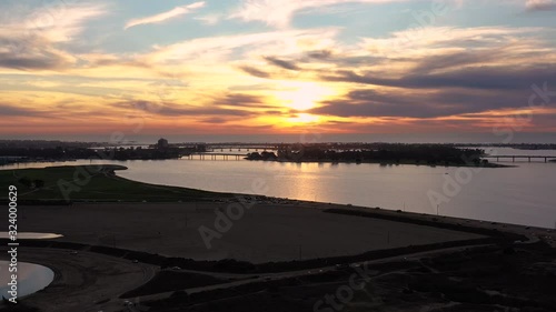 Aerial over stunning sunset over ocean and islands at Mission Bay photo