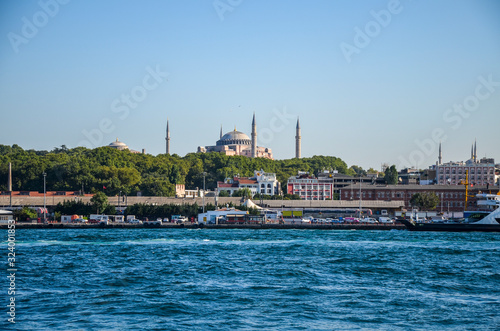 View of the city from the Bosphorus to the mosque of Hagia Sofia in Istanbul, Turkey. Tourist city landscape