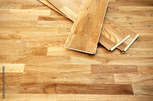 Parquetry, engineered click system oak wood flooring in a freshly renovated room