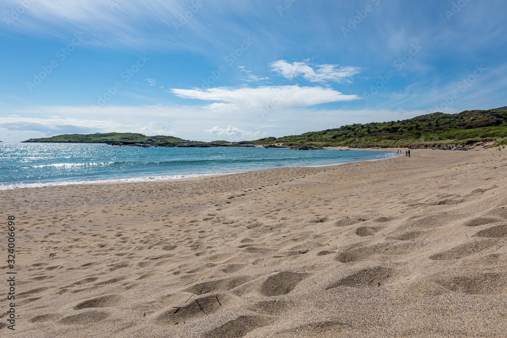 Sunny sand beach under sunny blue sky Sunny sand beach under sunny blue sky