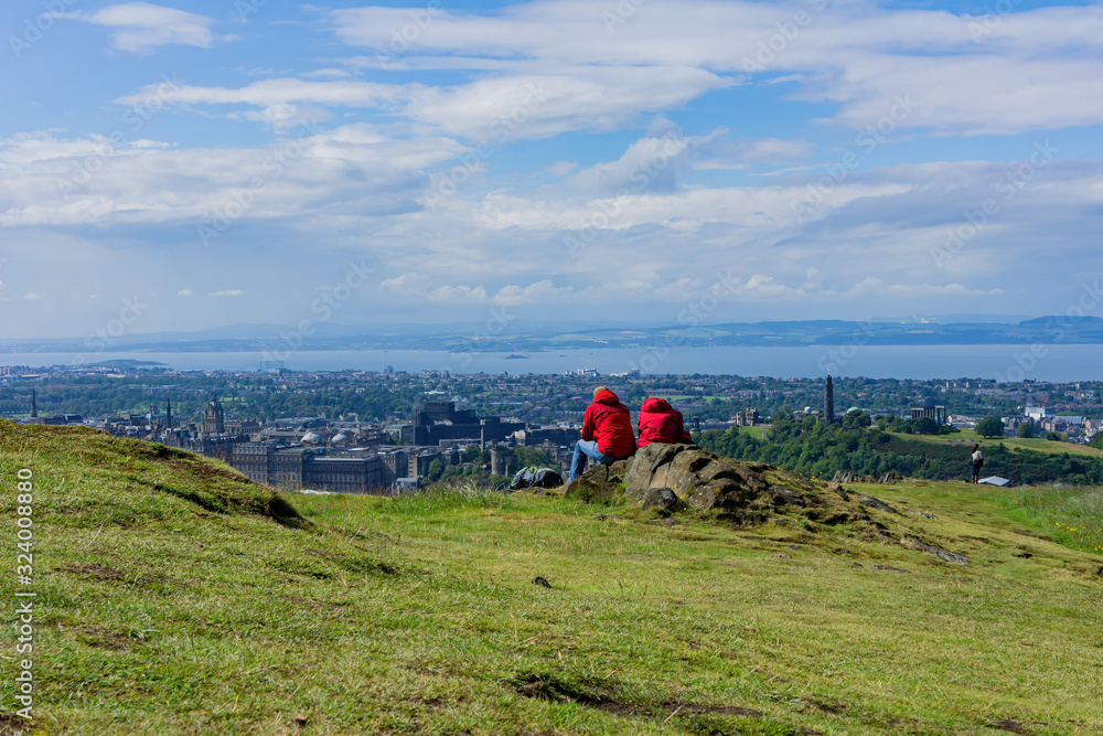 People enjuoing the high angle view cityscape from Holyrood Park People enjuoing the high angle view cityscape from Holyrood Park
