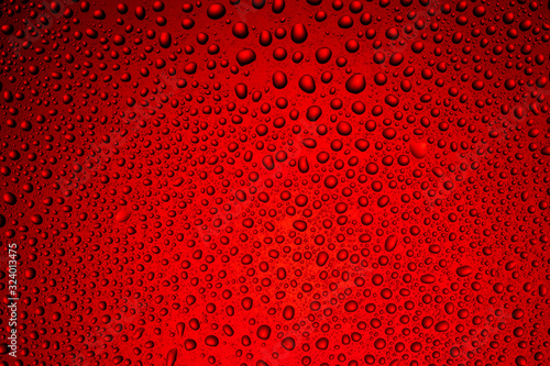 Vivid red background of liquid drops