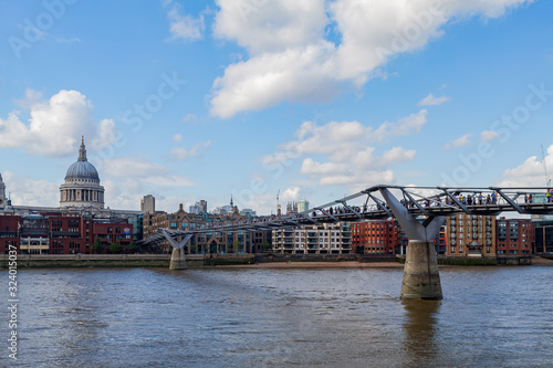 Afternoon view of the St. Paul's Cathedral, Millennium Bridge and Thames River