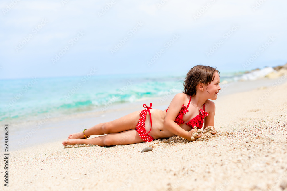 Little girl enjoying by the water Little girl enjoying by the water