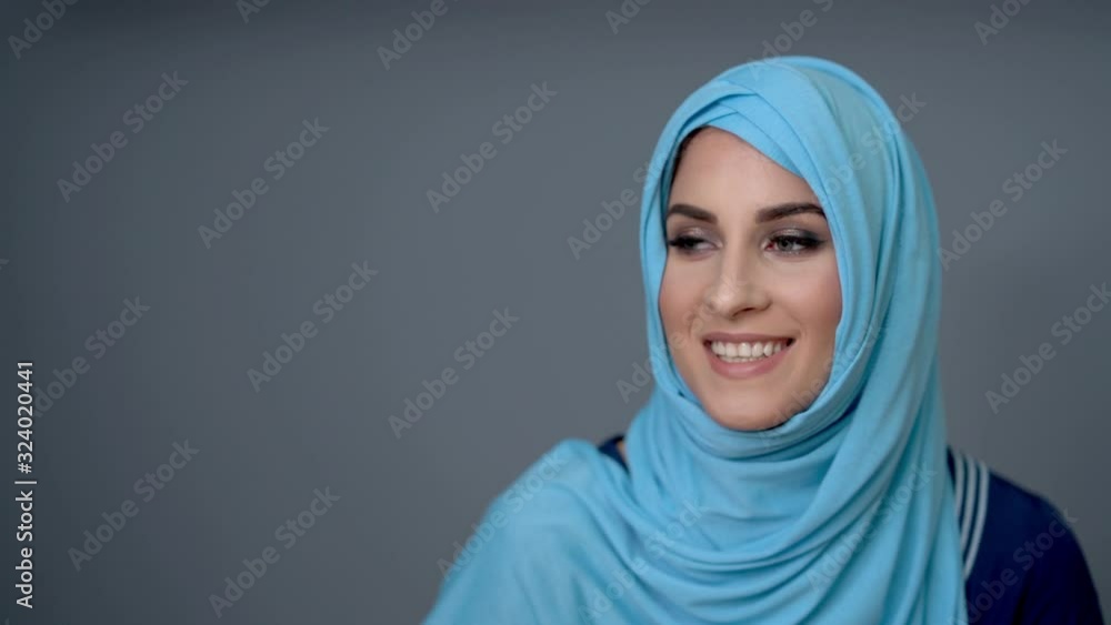 Female muslim student learning at home Female muslim student learning at home