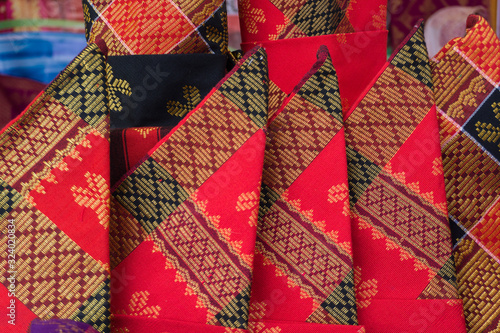 songket traditional fabric on market