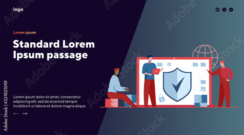 Antivirus and data safety. Developers with laptops standing near monitor with shield flat vector illustration. Software, access, safeguard concept for banner, website design or landing web page