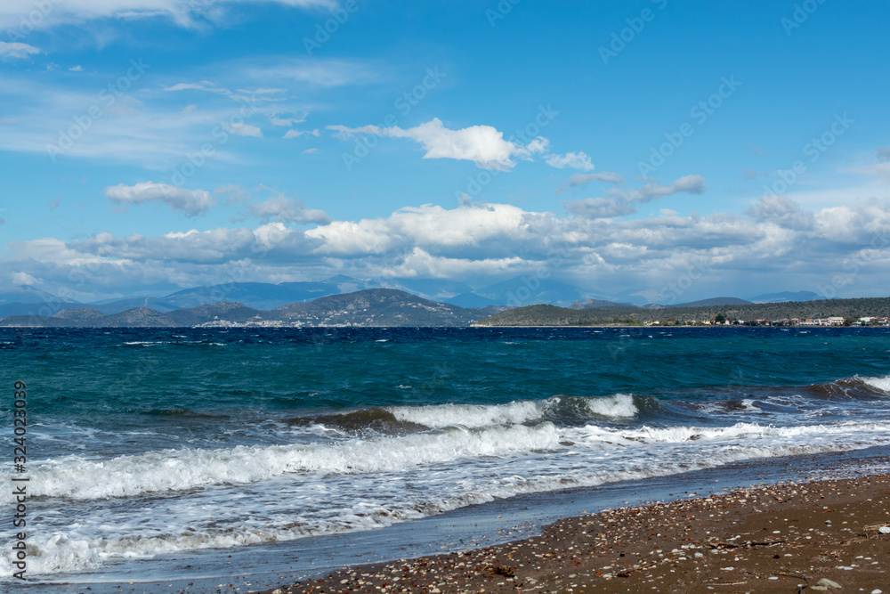 Dramatic colorful seascape with view on mountains of Peloponnese, Greece