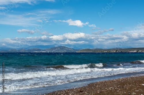 Fototapeta Naklejka Na Ścianę i Meble -  Dramatic colorful seascape with view on mountains of Peloponnese, Greece