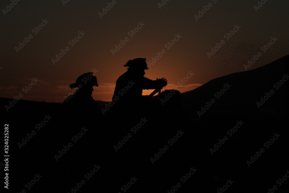 silhouette of a fireman 
