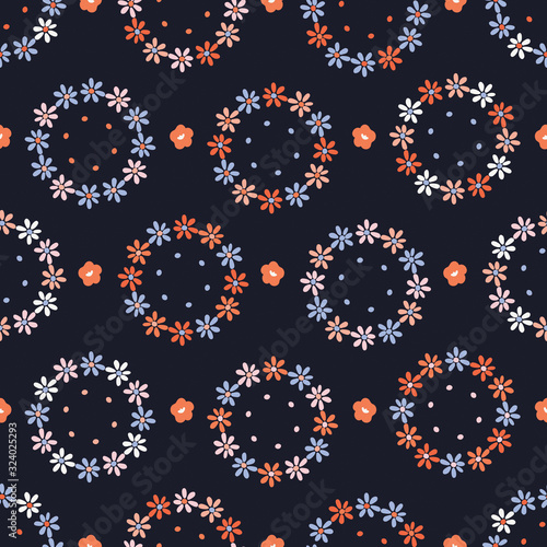 Pretty dark floral daisy circle texture background. Variegated dotty flower seamless pattern. Funky colorful all over print. Elegant trendy moody modern fashion swatch.