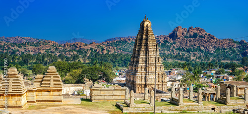 Virupaksha Temple, located in the ruins of ancient indian city Vijayanagar in Hampi, Karnataka, India. photo