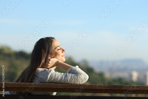 Canvas Woman relaxing relieving stress on a bench