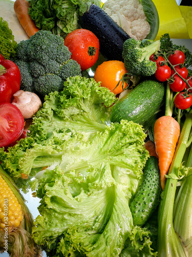 Closeup image of big assortment of fresh and ripe vegetables