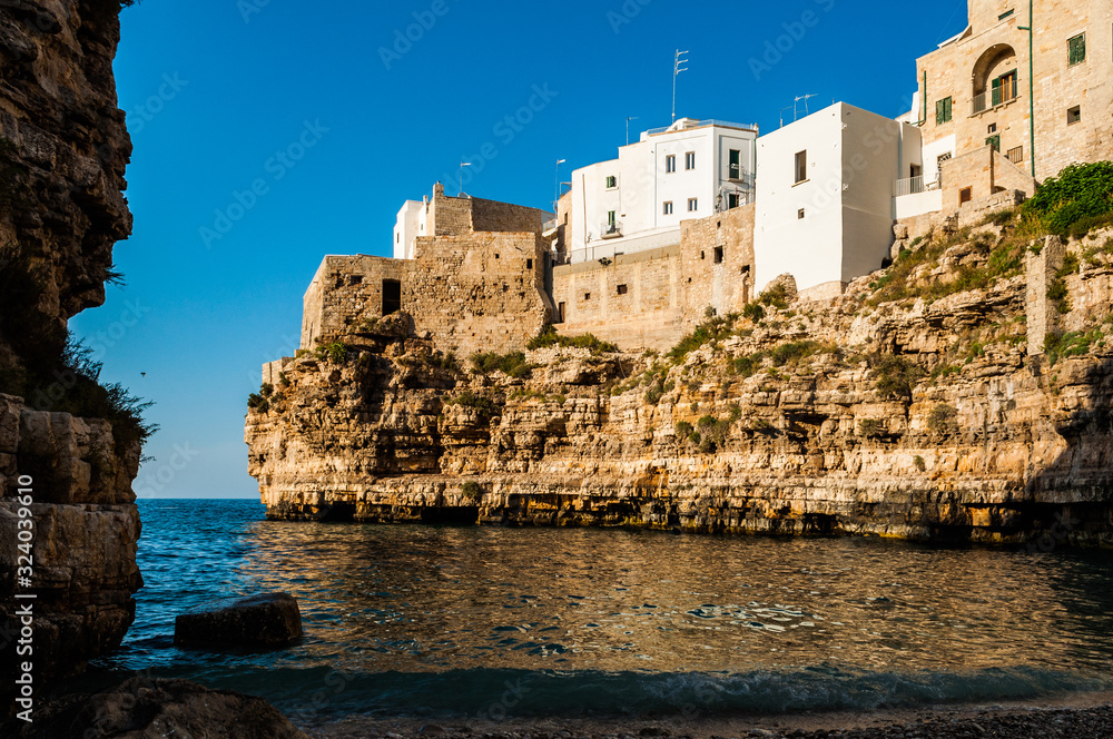 Spectacular view on an ancient building on the cliff over the sea