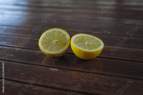  Lemon cut on a wooden table