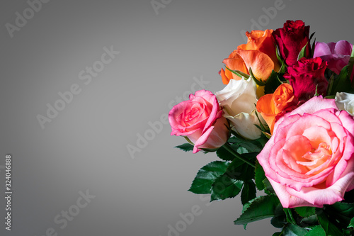 Bouquet of multi-colored roses isolated on white