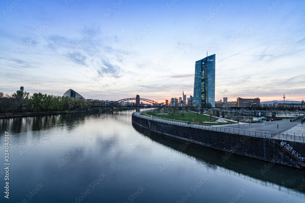Frankfurt skyscraper reflection on main river, sunset