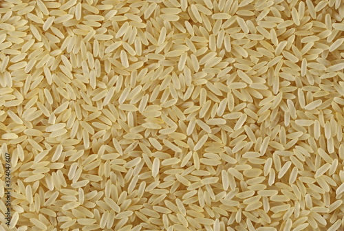 Parboiled rice background and texture