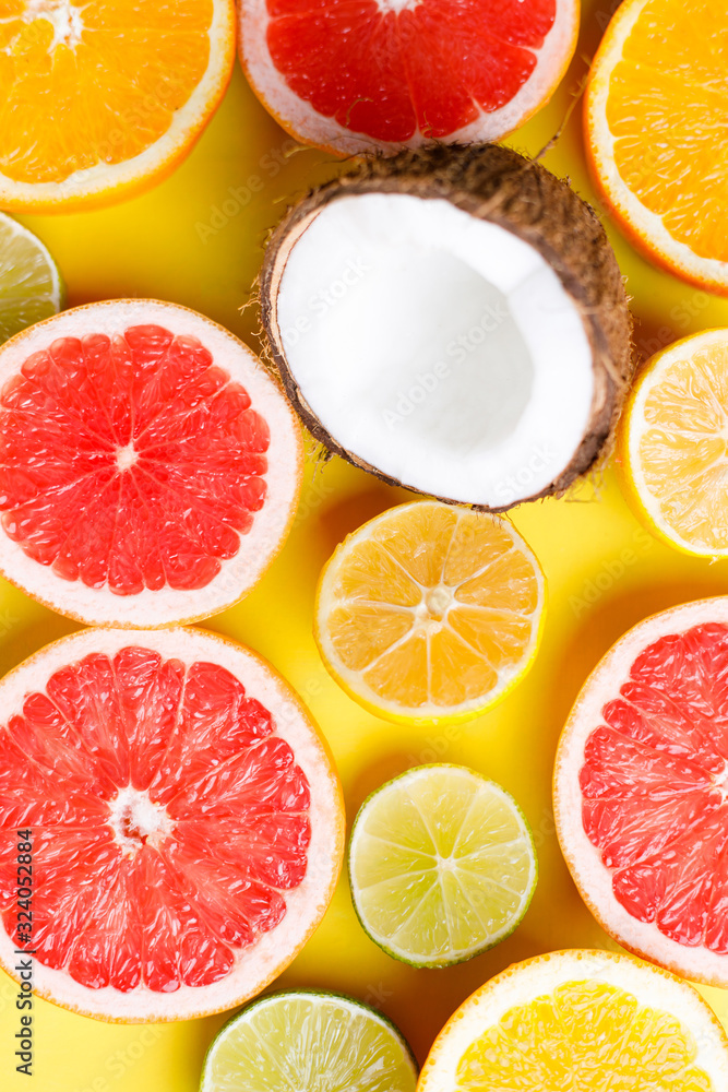 Summer vibes. Tropical background, citrus texture on yellow background. Summertime vacation, cocktail, tropical beach. Creative fruity layout Summer vibes. Tropical background, citrus texture on yellow background. Summertime vacation, cocktail, tropical beach. Creative fruity layout
