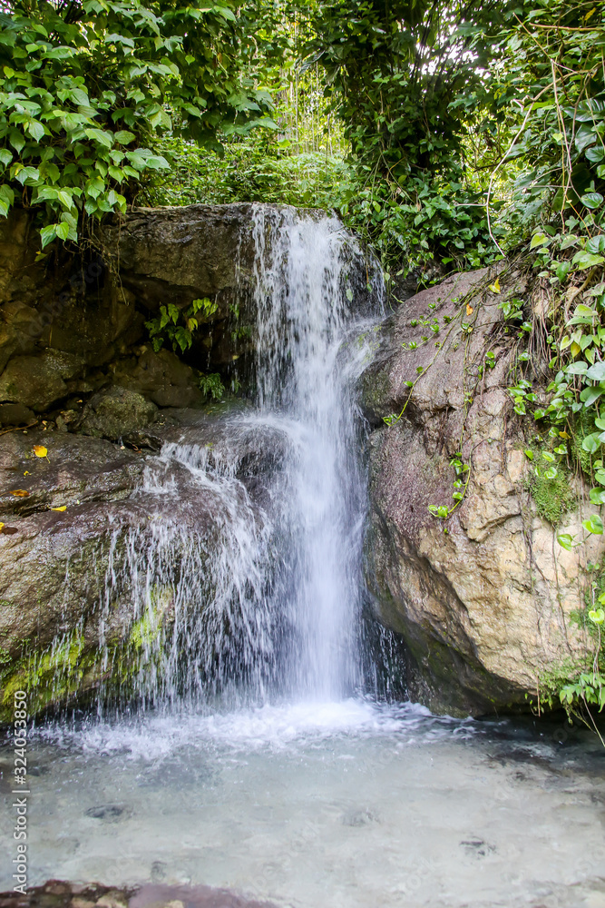 Fototapeta premium dramatic image of fresh spring water of Villa miriam, paraiso, dominican republic.