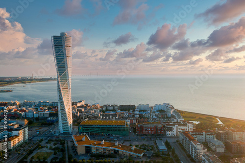 Billede på lærred Beautiful aerial panoramic view of the Malmo city in Sweden by the sea with the Oresund bridge visible on the horizon