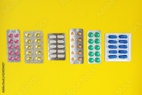 group of pharmaceutical medication and medicine pills in packs