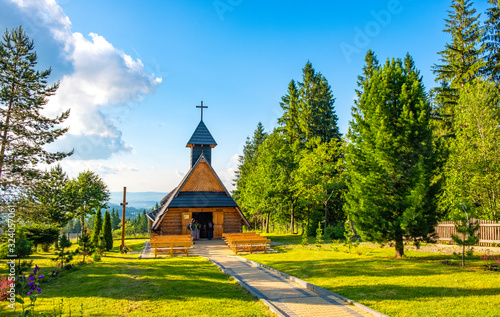Zakopane, Poland - Holy Mary of the Rosary chapel at the Gubalowka mountain over the Zakopane resort in Tatra Maintains photo