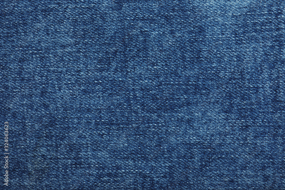 Texture of dark blue jeans as background, closeup Texture of dark blue jeans as background, closeup