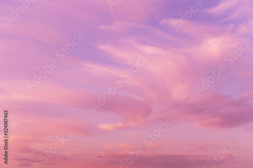 Dramatic sunrise, sunset pink violet sky with clouds background texture © Viktor Iden